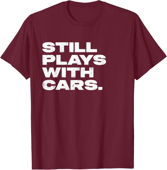 Still Plays With Cars Funny Garage Mechanic T-Shirt - T-Shirt | Maroon