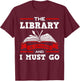The Library Is Calling And I Must Go Reading Books Bookworm T-Shirt - T-Shirt | Maroon