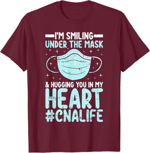CNA Certified Nursing Assistant I’m Smiling Under the Mask T-Shirt - T-Shirt | Maroon