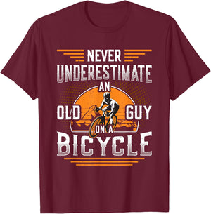 Never Underestimate An Old Guy On A Bicycle Old Guy Bike T-Shirt - T-Shirt | Maroon