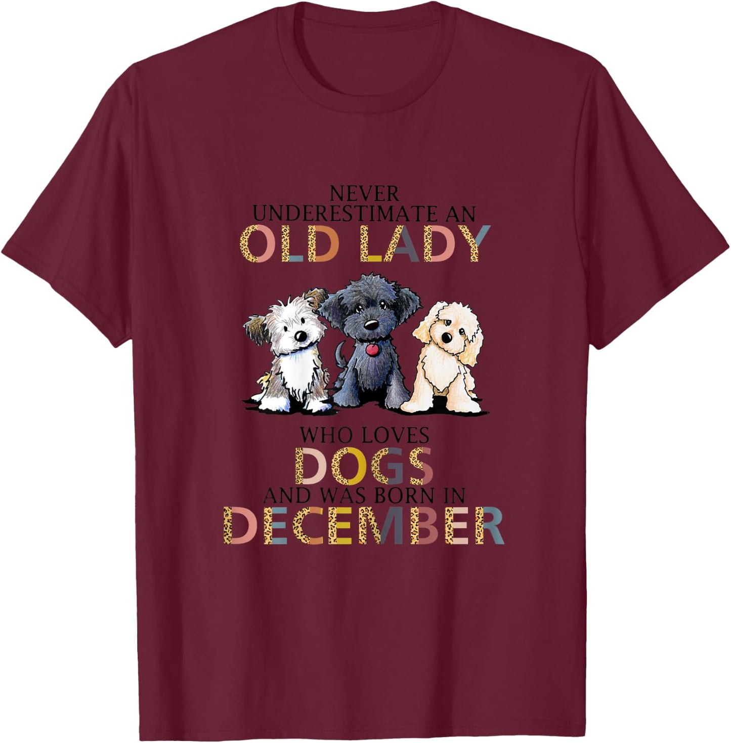 Never Underestimate Old Lady Loves Dogs Born In December T-Shirt - T-Shirt | Maroon