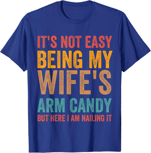 It's Not Easy Being My Wife's Arm Candy Here I Am Nailing it T-Shirt - T-Shirt | Royal