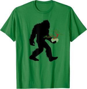 Bigfoot Carrying Bonsai Plant Sasquatch Tree Landscaper T-Shirt - T-Shirt | Irish Green