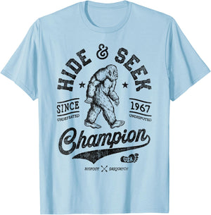 Bigfoot Hide And Seek Champion Funny Sasquatch Retro Vintage T-Shirt - T-Shirt | Light Blue