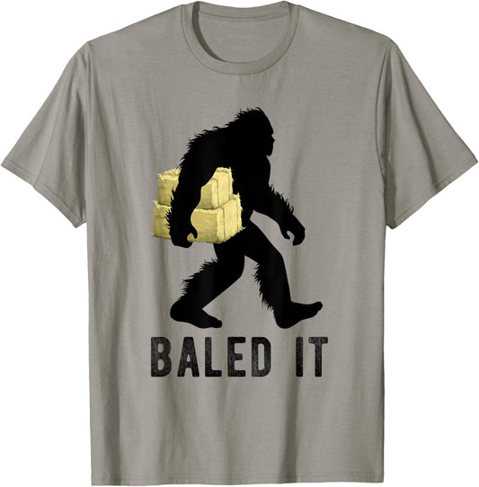 Bigfoot Farmer With Hay Bale Funny Sasquatch Farming T-Shirt - T-Shirt | Sand