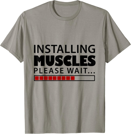 Installing muscles please wait Men Women Kids funny T-Shirt - T-Shirt | Sand